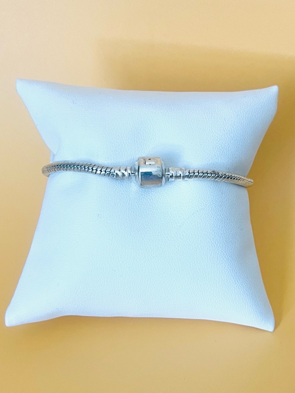 Silver bangle bracelet with a round clasp, stamped .925